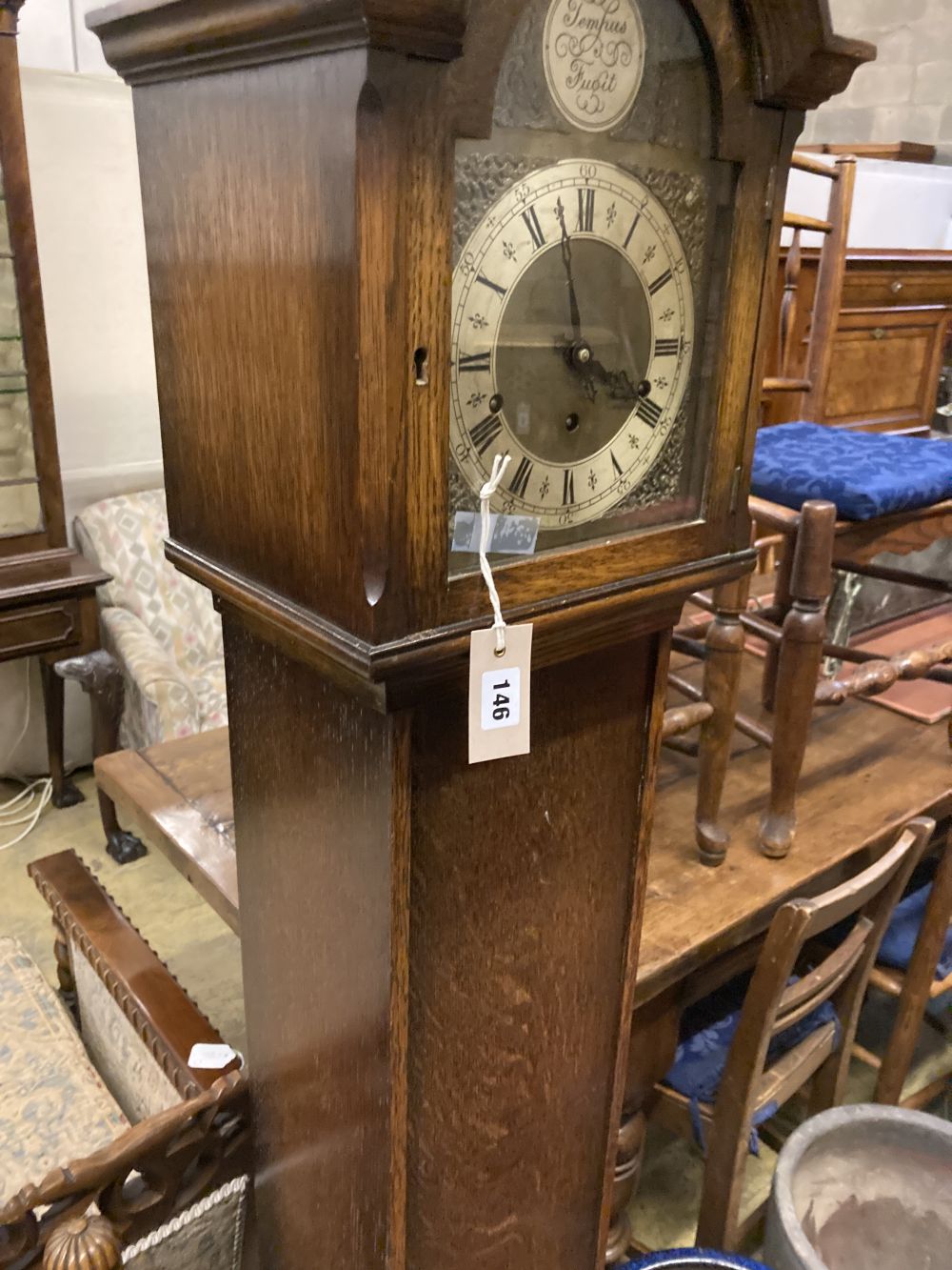 A 1930s oak cased eight day striking and chiming longcase clock, height 169cm